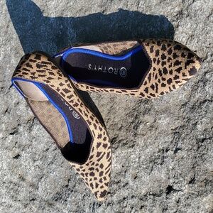 Rothy's Cheetah Pattern Flats with Vibrant Blue Accent